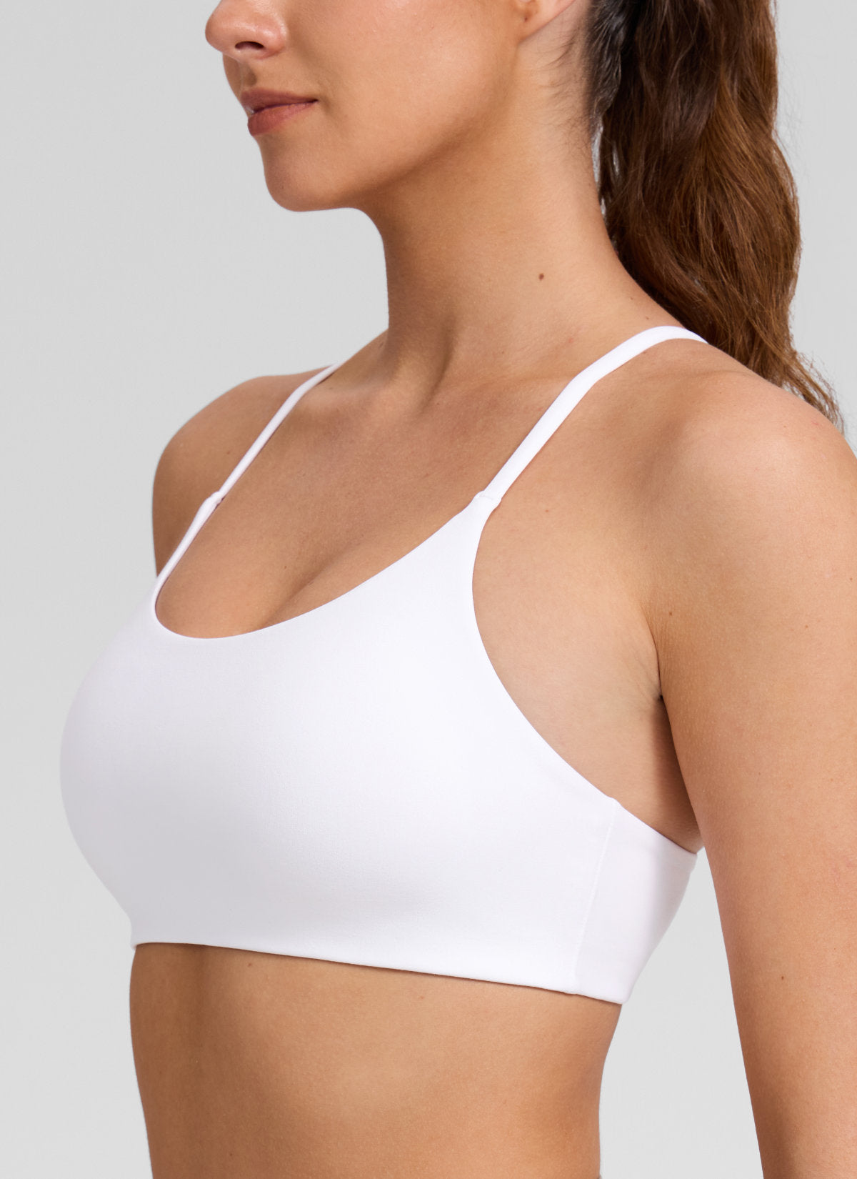 CRZ YOGA Women's Butterlift® Yoga V Back Double Lined Sports Bra White @model_info:Gelya
