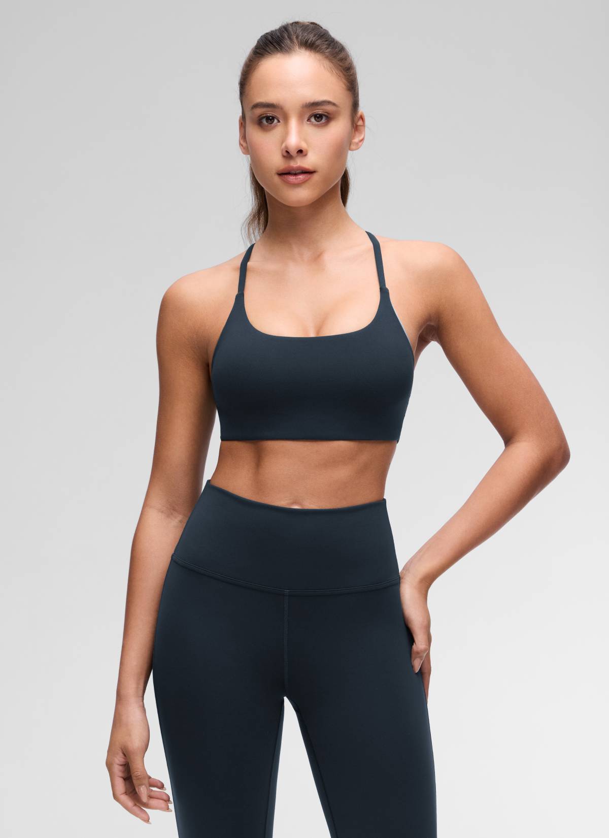CRZ YOGA Women's Butterluxe Yoga Scoop Neck Twist Cross Back Sport Bra True Navy @model_info:Maria
