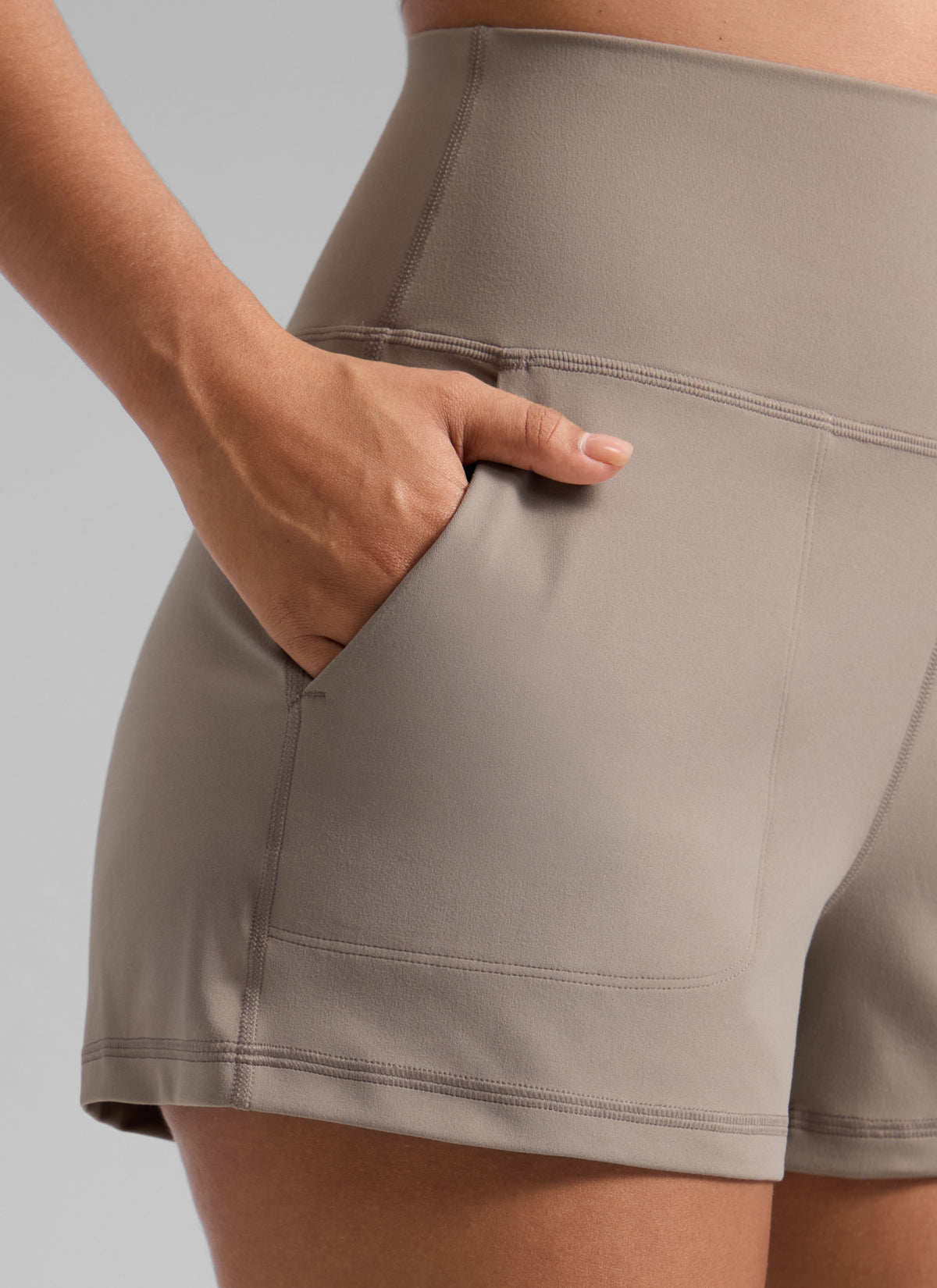 CRZ YOGA Women Butterlift High Waisted Shorts with Pockets Linerless Creamy Latte @model_info:T